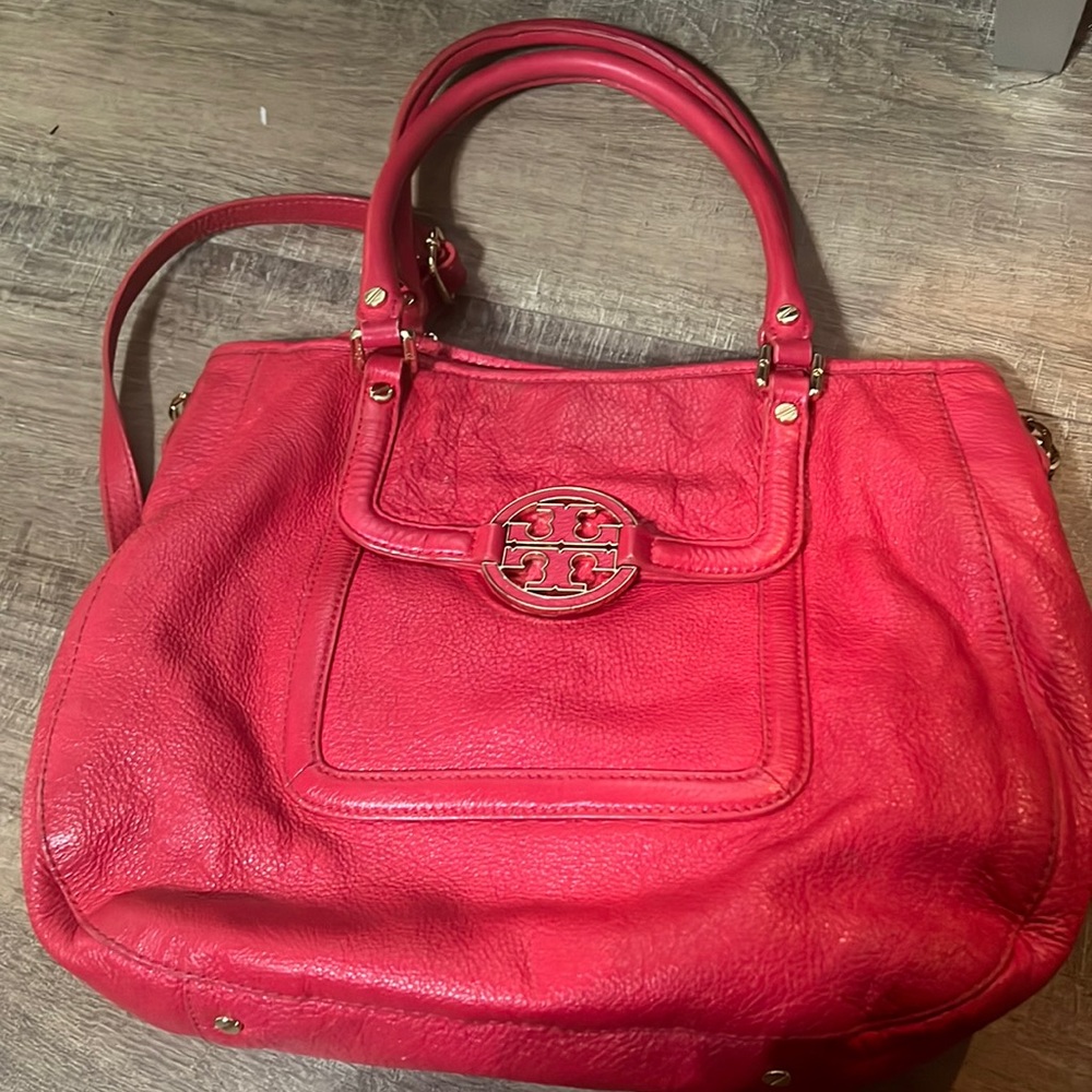 Red Tory Burch bag with handle and strap